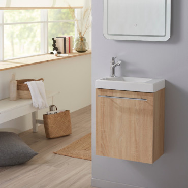 Meuble lave-mains Alterna Piccolo 2 bois clair installé dans une petite salle de bain moderne